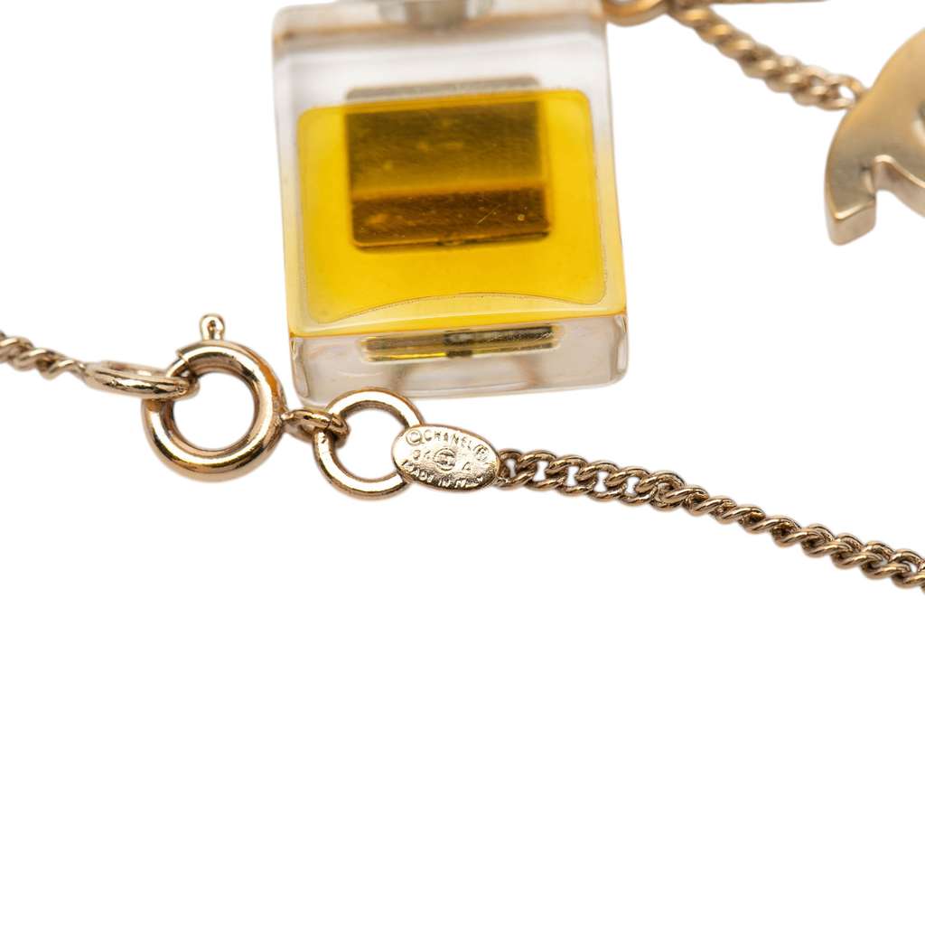 Chanel Gold Plated No 5 Perfume Bottle and CC Pendant Necklace Gold Metal Good condition - Model View