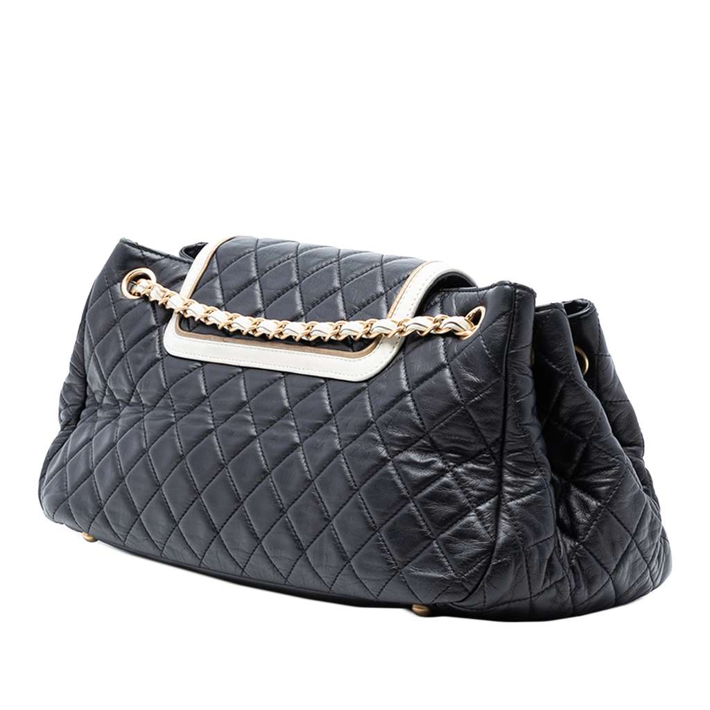 Chanel Medium Quilted Lambskin Reissue 2.55 East West Mademoiselle Accordion Flap Black Leather Very good condition - Back View