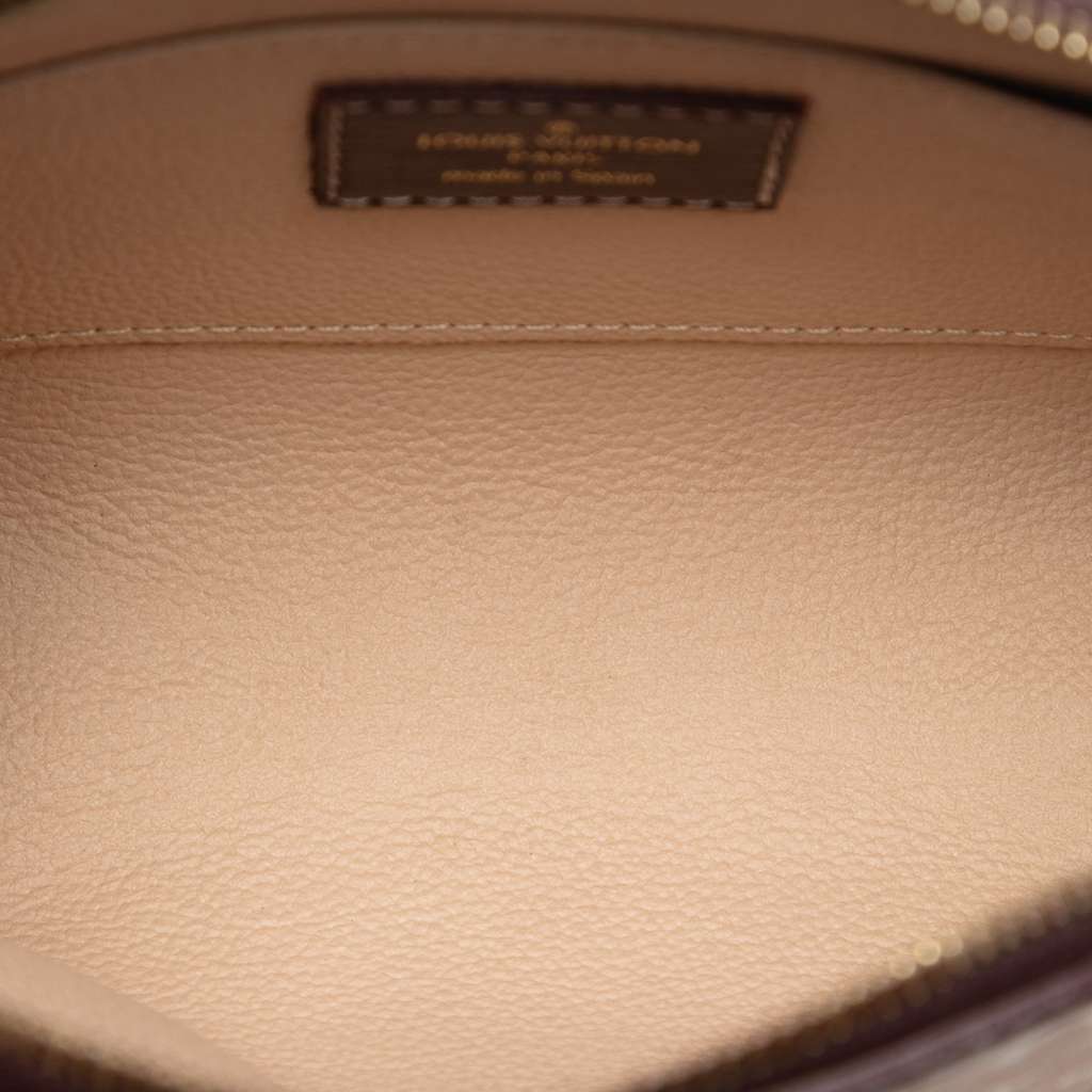 Louis Vuitton Monogram Mini Lin Cosmetic Pouch Red Canvas Good condition - Model View