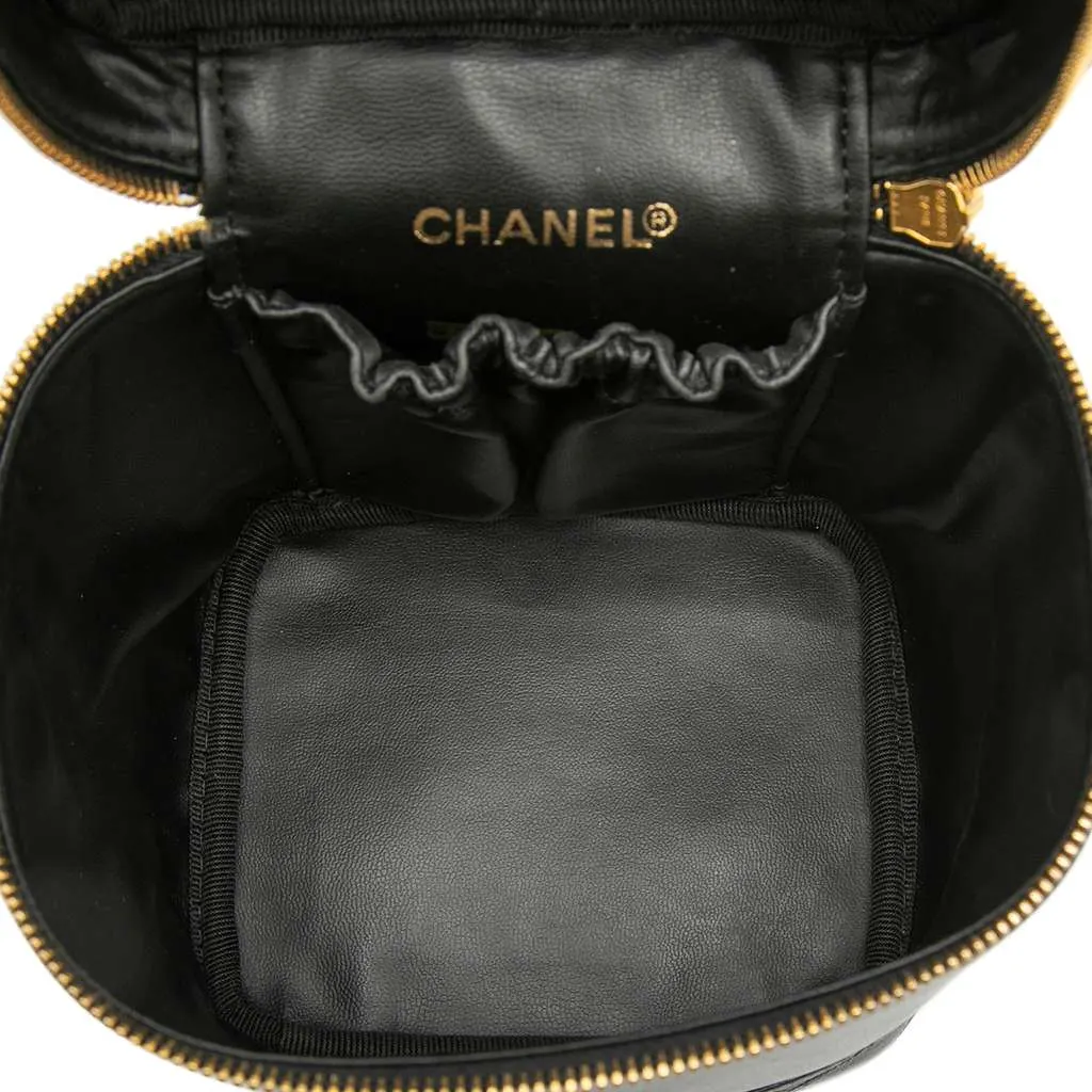 Chanel CC Lambskin Vanity Case Black Leather Good - Model View