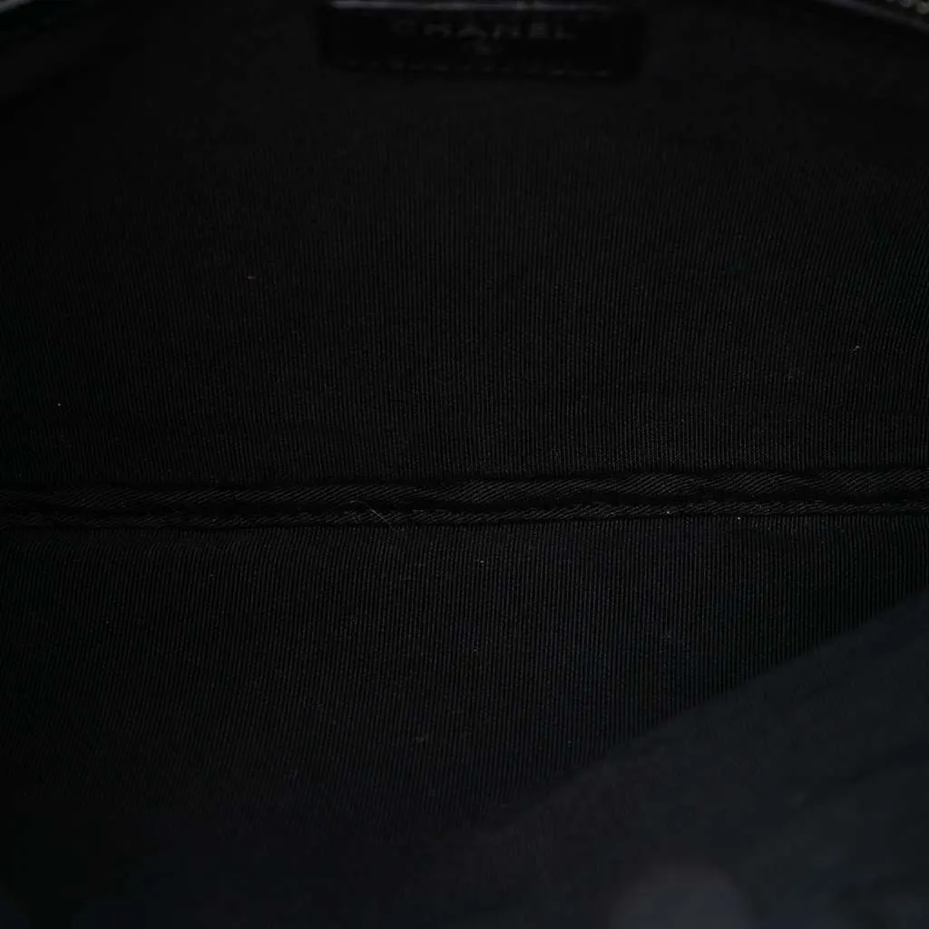 Chanel Medium Quilted Caviar Boy O Case Clutch Black Leather Good - Model View