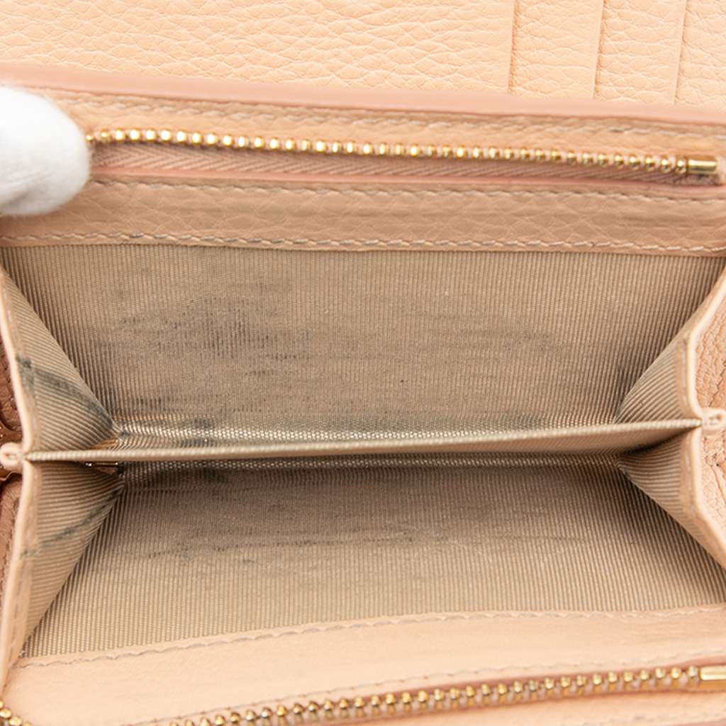 Gucci Small GG Emblem Leather Bifold Wallet Beige Leather Good condition - Model View