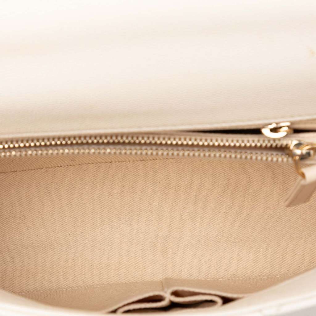 Chanel Small Quilted Caviar Coco Top Handle Bag White Leather Good condition - Model View