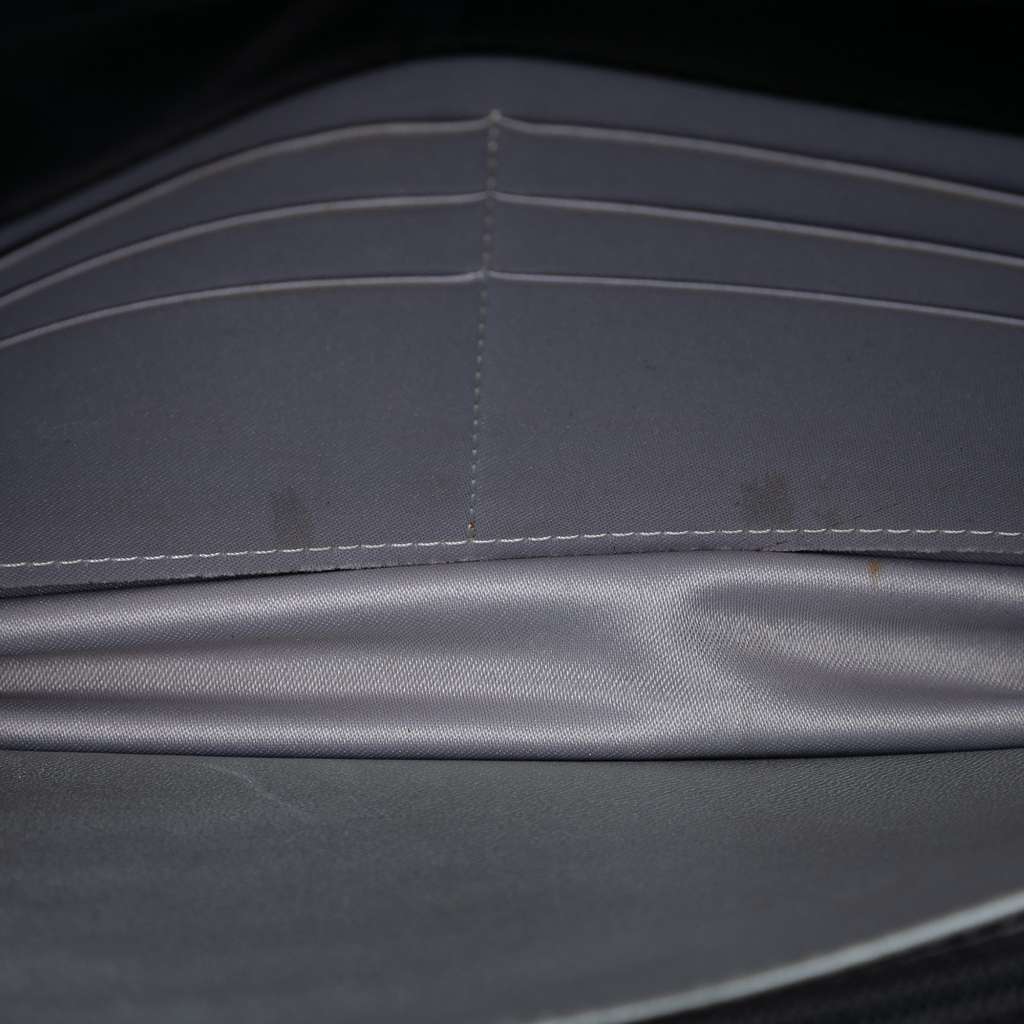 Chanel CC Embossed Lambskin Camellia Wallet On Chain Black Leather Good condition - Model View