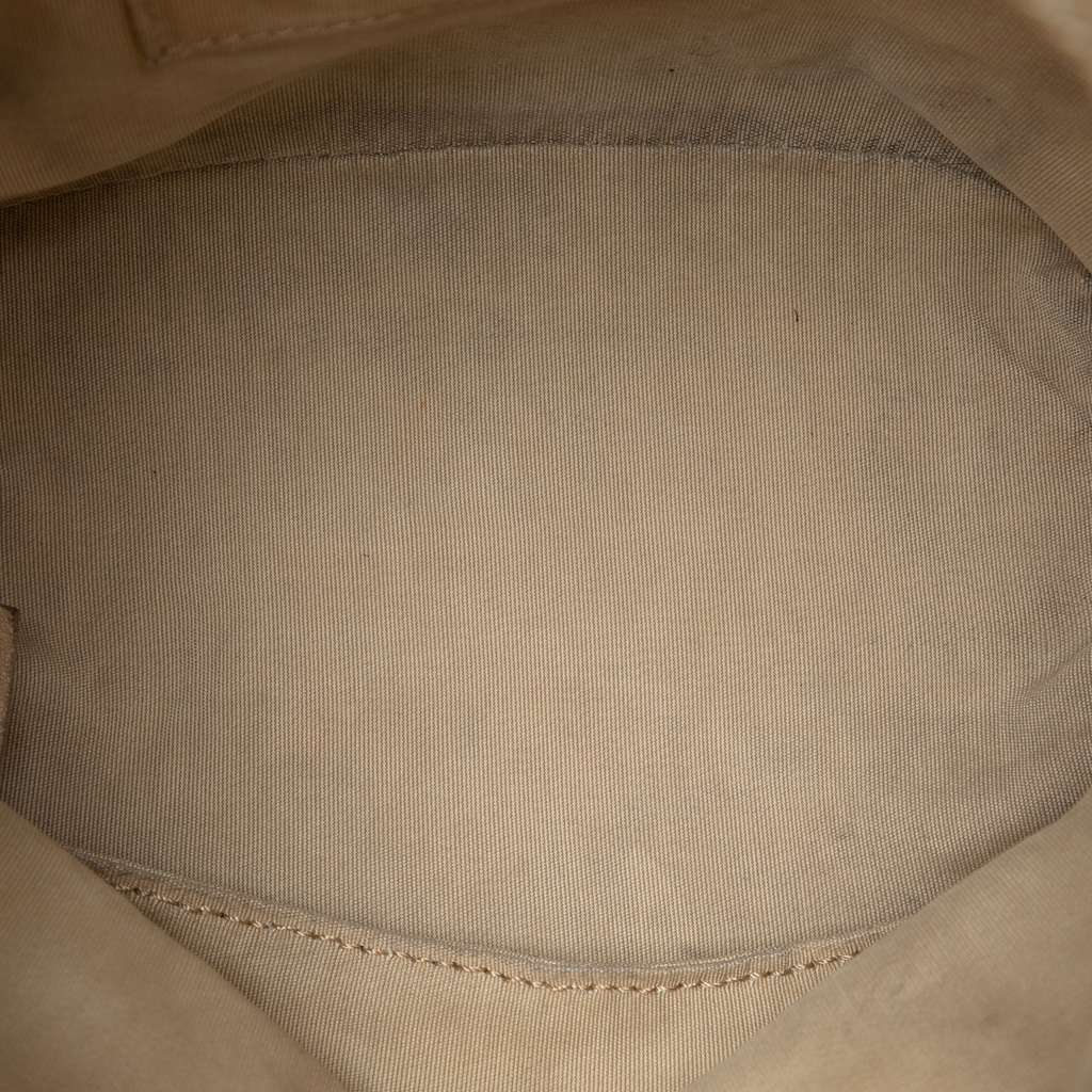 Chanel Small Chevron Calfskin Stud Wars Drawstring Bucket Bag Beige Leather Good condition - Model View