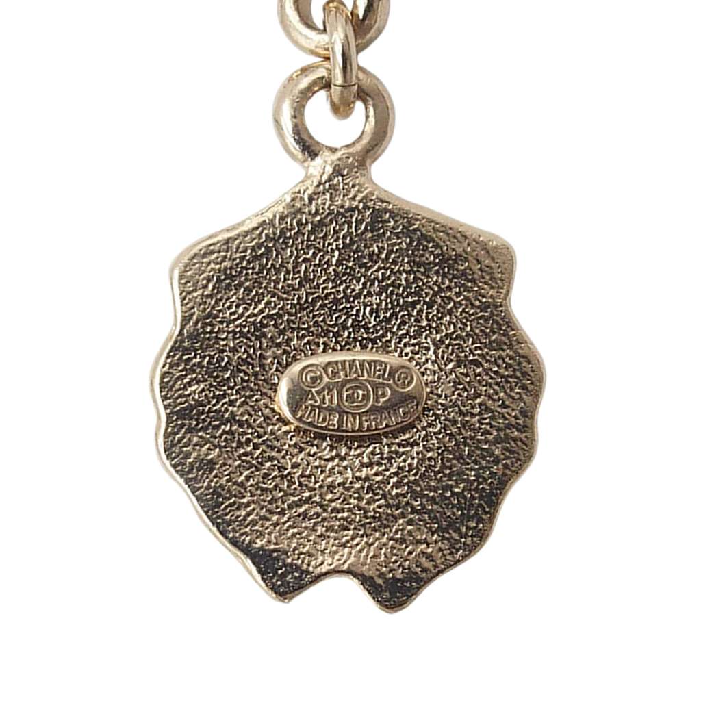 Chanel CC Gold Plated Faux Pearl Lion Head Drop Push Back Earrings Gold Metal Good condition - Model View