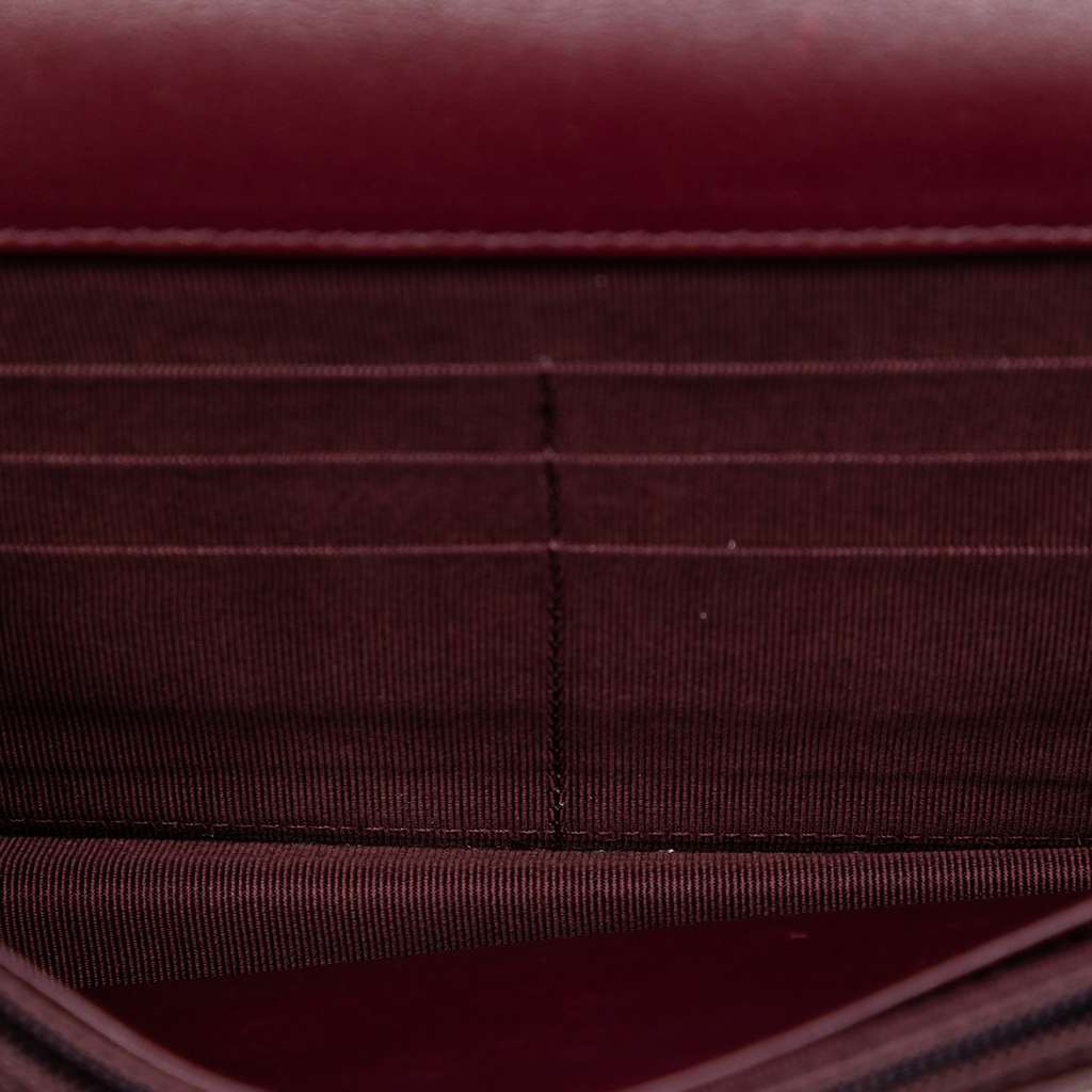 Chanel CC Quilted Striated Metallic Patent Wallet on Chain Red Leather Good condition - Model View