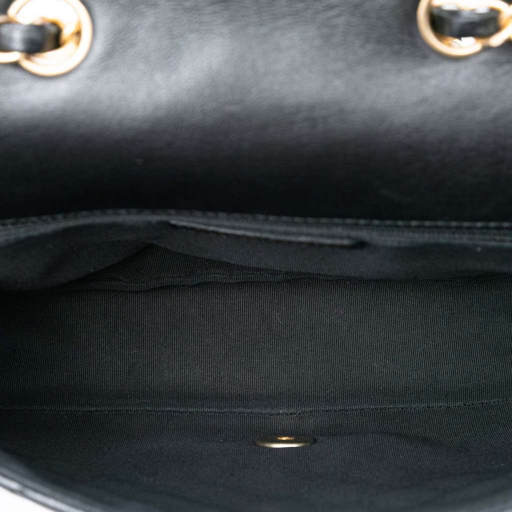 Chanel Quilted Lambskin Braided Saddle Flap Black Leather Good condition - Model View