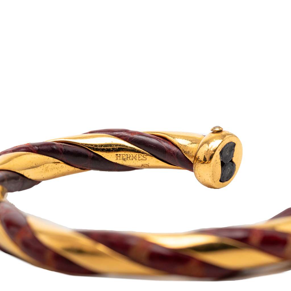 Hermès Gold Plated and Leather Twisted Cuff Bracelet Gold Metal Good condition - Model View
