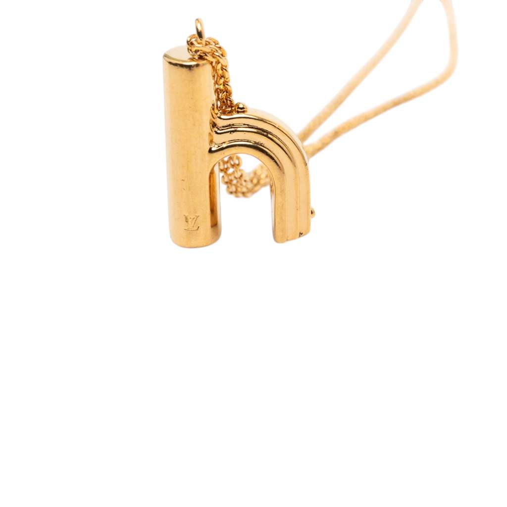 Louis Vuitton Gold Plated LV and Me Letter h Pendant Necklace Gold Metal Very good condition - Model View