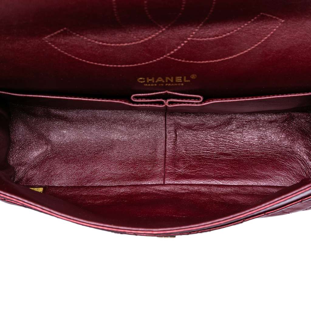 Chanel Quilted Metallic Lambskin Reissue 2.55 Double Flap 227 Red Leather Very good condition - Model View