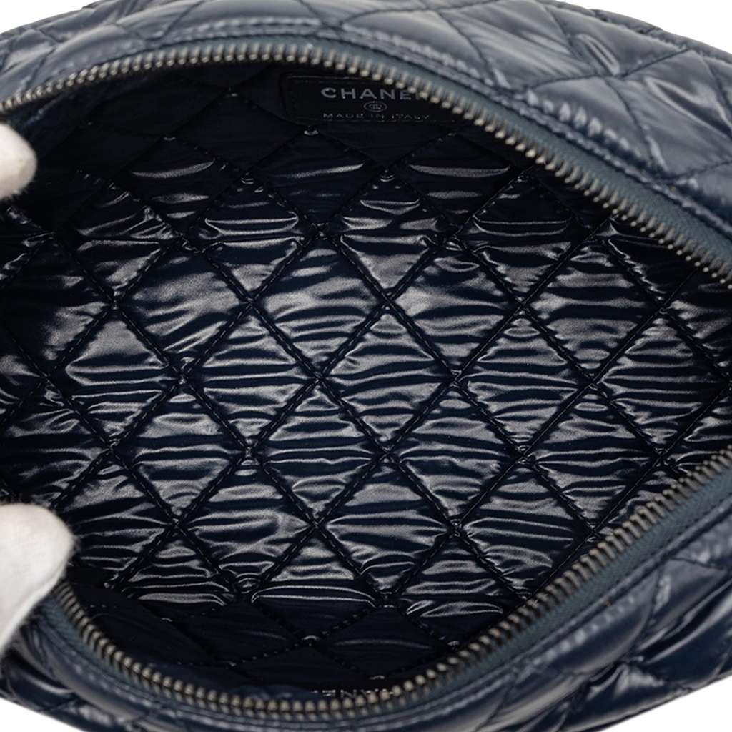 Chanel Quilted Nylon Coco Cocoon Pouch Blue Never worn - Model View