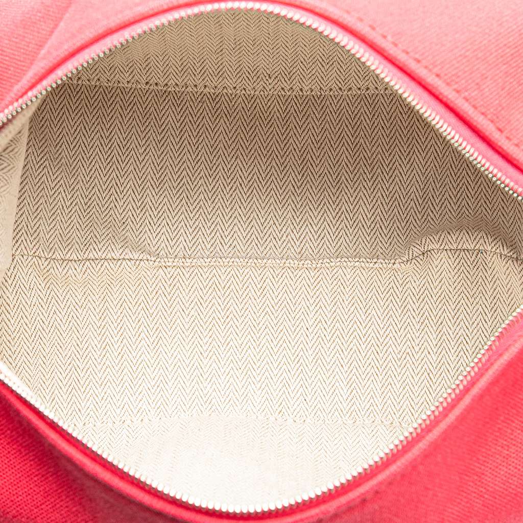 Hermès Small Toile Bride A Brac Case Pink Canvas Never worn - Model View