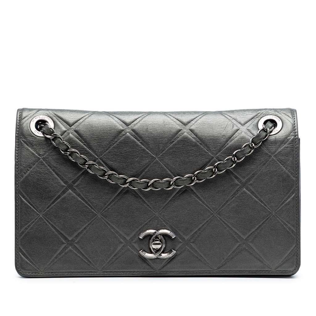 Chanel Medium Embossed Calfskin Propeller Flap