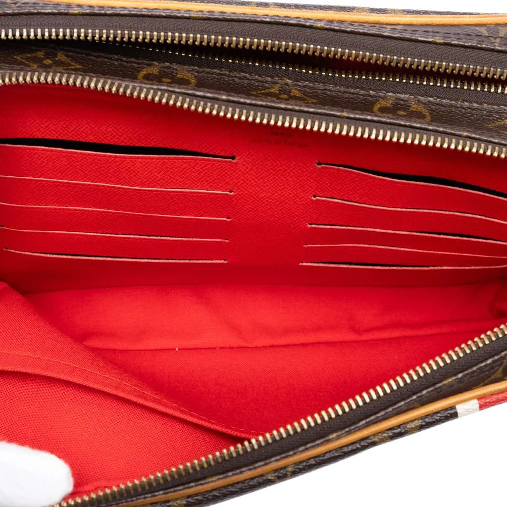 Louis Vuitton Monogram China Run Pavel Clutch Brown Very good - Model View