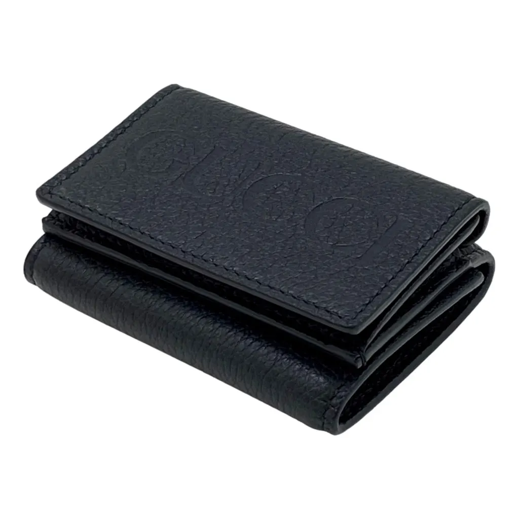 Gucci Embossed Logo Mini Tri-Fold Wallet Black Pebbled Leather Black Leather Never worn, with tag - Model View