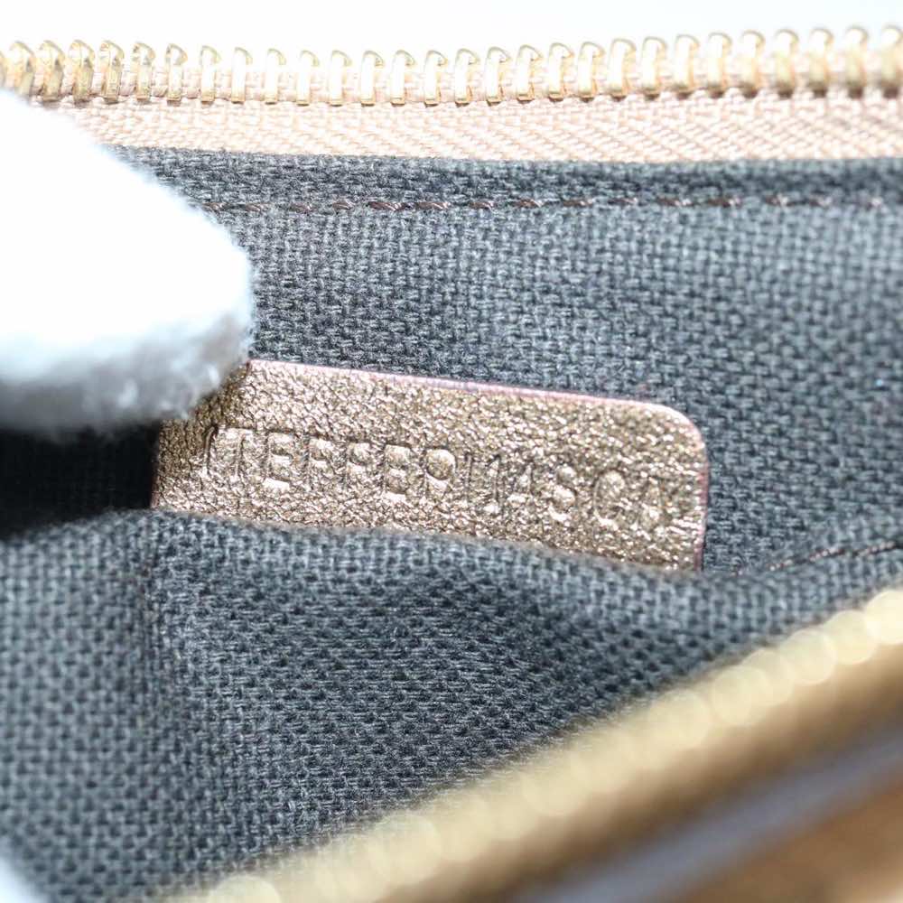 Burberry  - Side view