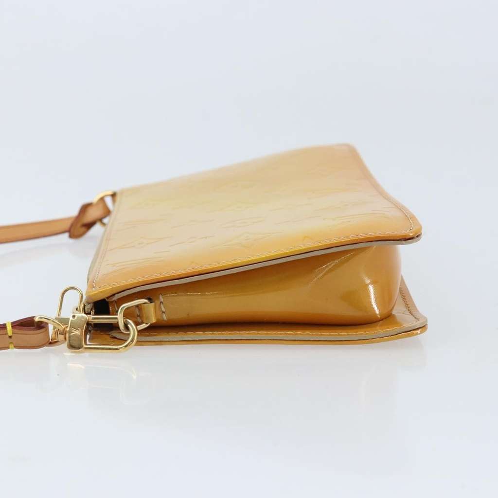 Louis Vuitton Lexington Pochette Beige Good condition - Model View