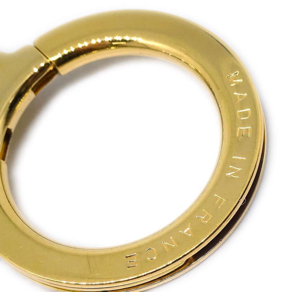 Louis Vuitton Bolt Pochette Extender Keychain Gold Good condition - Model View