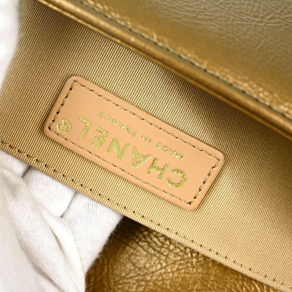 Chanel Boy Flap Bag Gold Leather Good condition - Model View