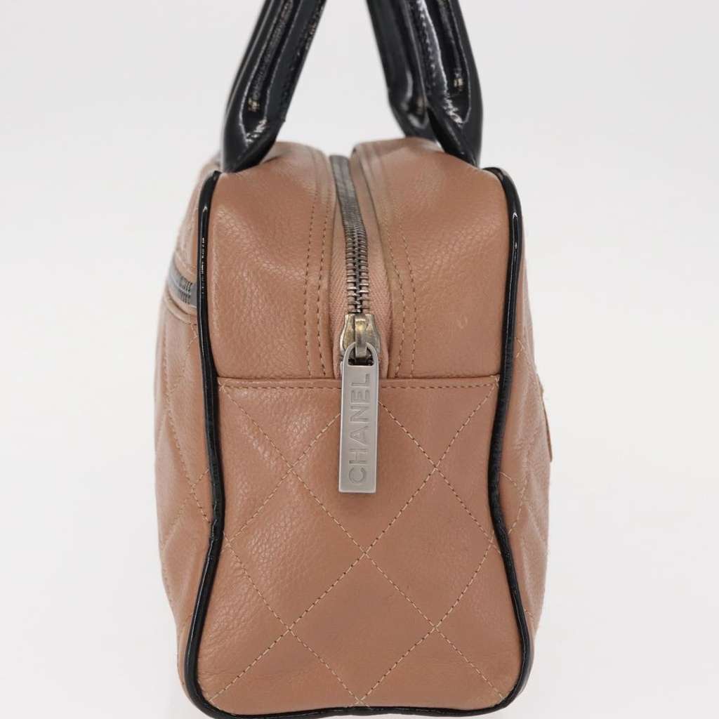 Chanel Embossed Logo Bowler Bag Beige Leather Good condition - Model View