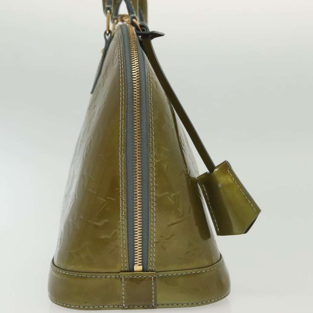 Louis Vuitton Alma Handbag Green Good condition - Model View
