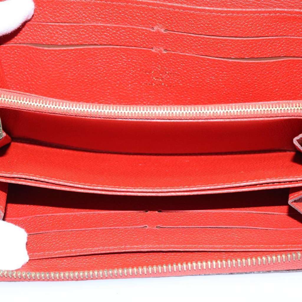 Louis Vuitton Portefeuille zippy Monogramme Empreinte Red Leather Good condition - Box View