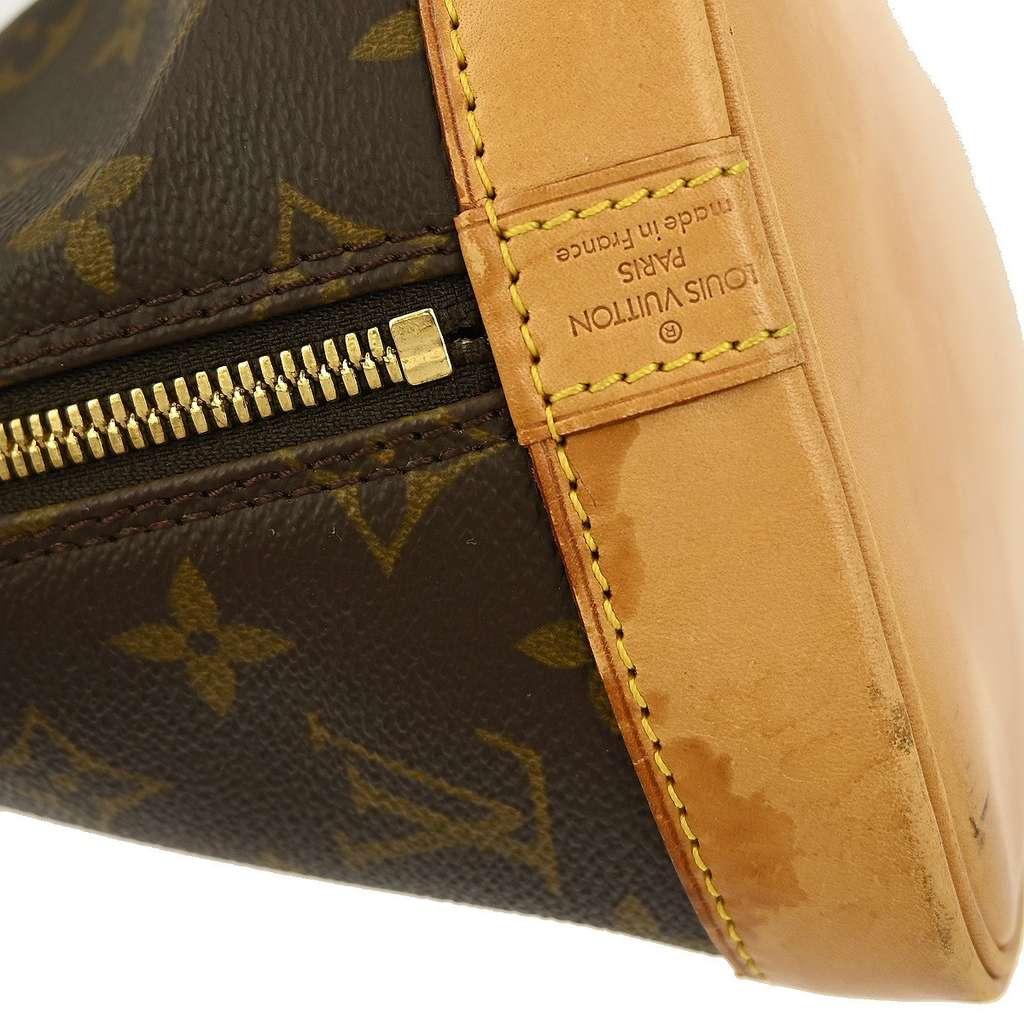 Louis Vuitton Alma Handbag Brown Canvas Fair condition - Model View