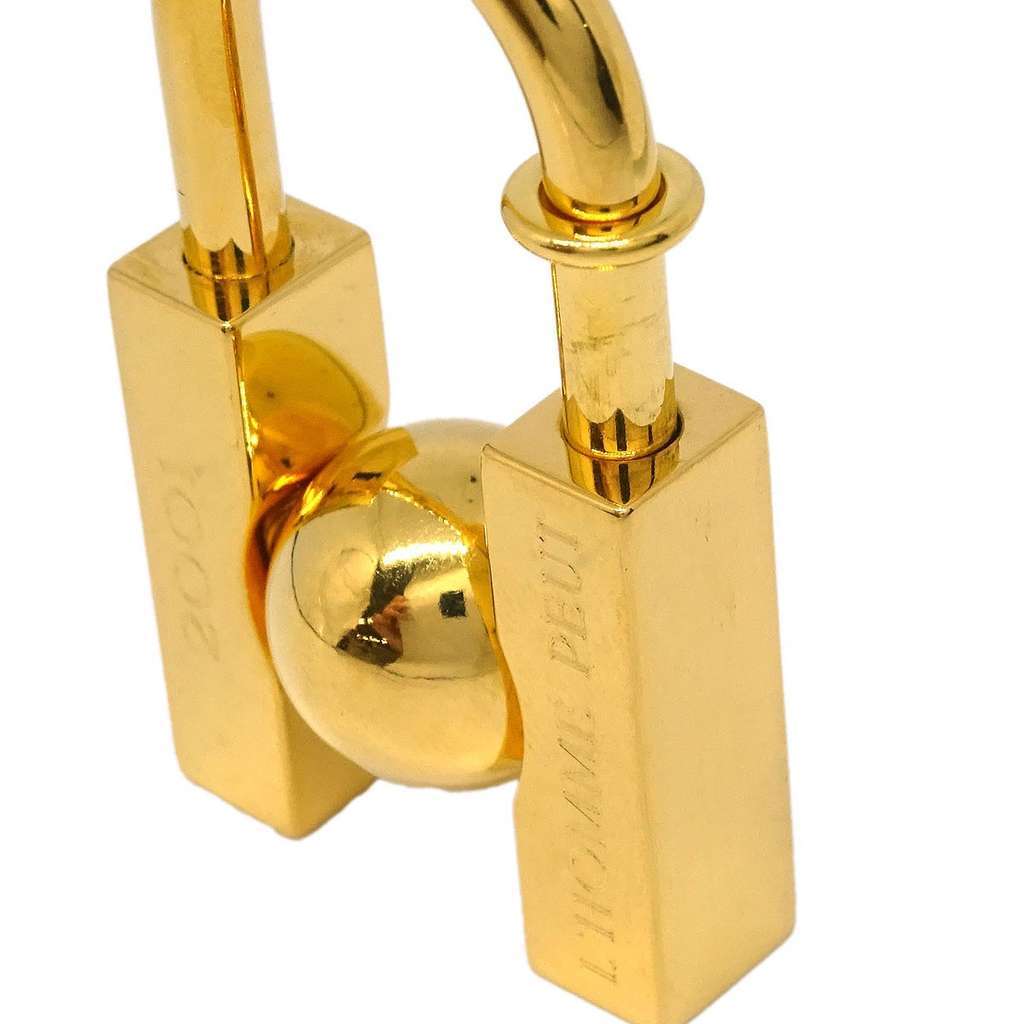 Hermès LHomme Peut Embellir La Terre Cadena Lock Charm Gold Good condition - Inside View