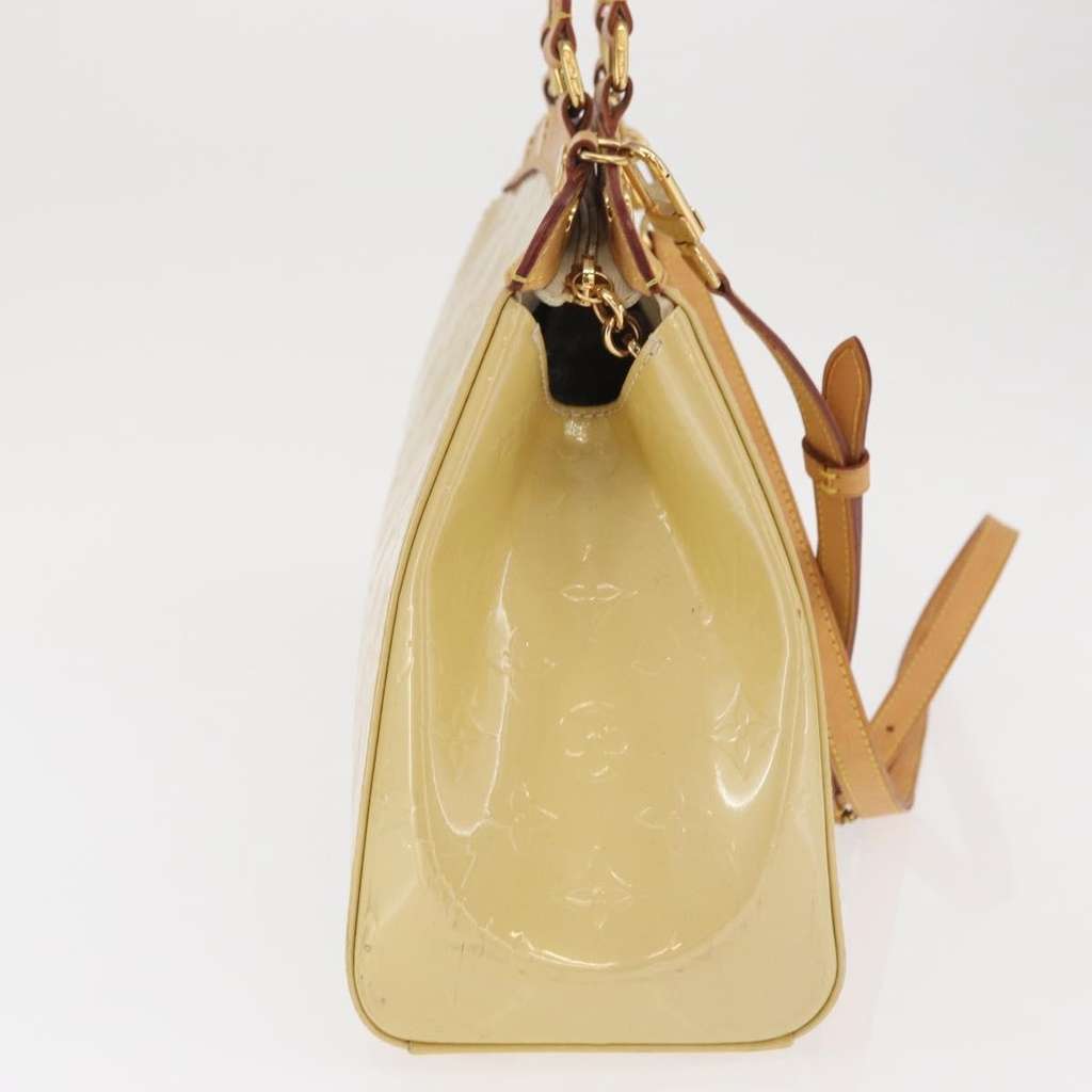 Louis Vuitton Brea Handbag Beige Good condition - Model View