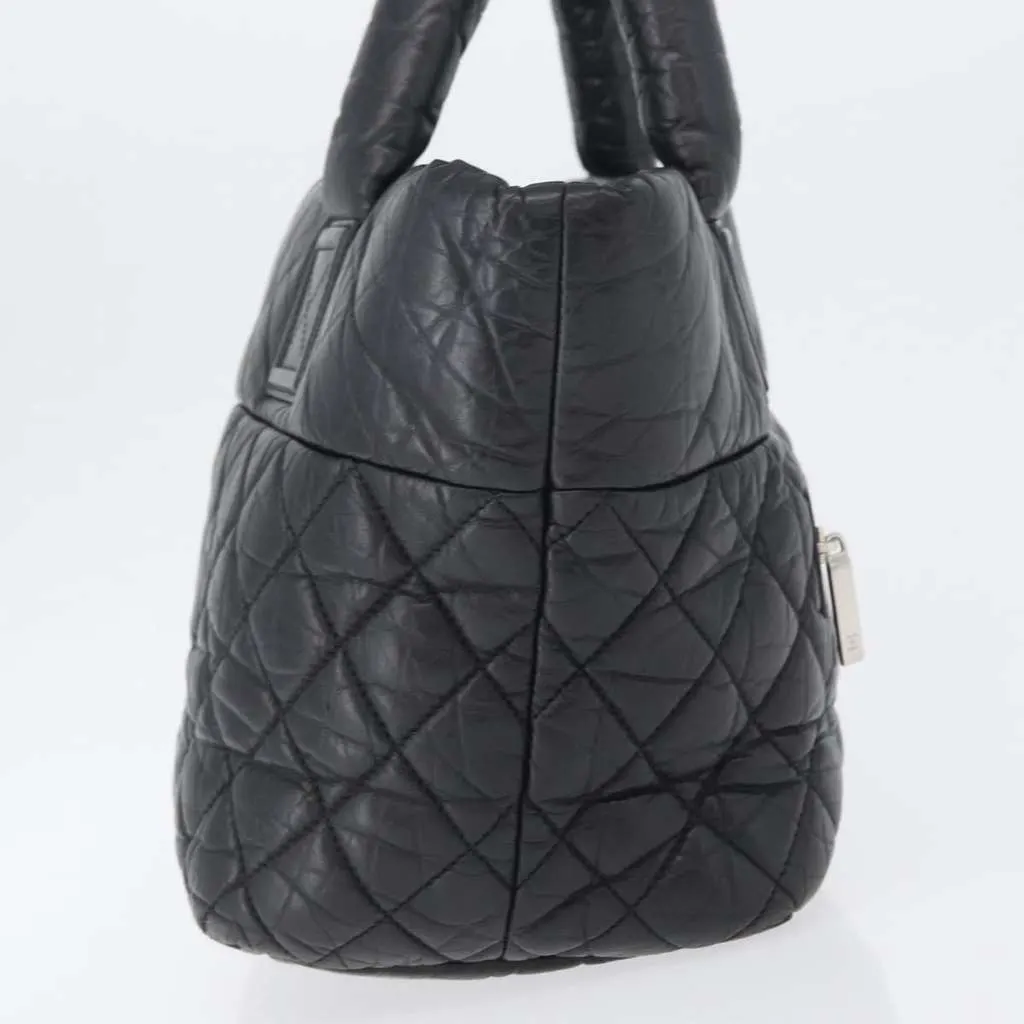 Chanel Coco Cocoon Reversible Tote Black Leather Good - Model View