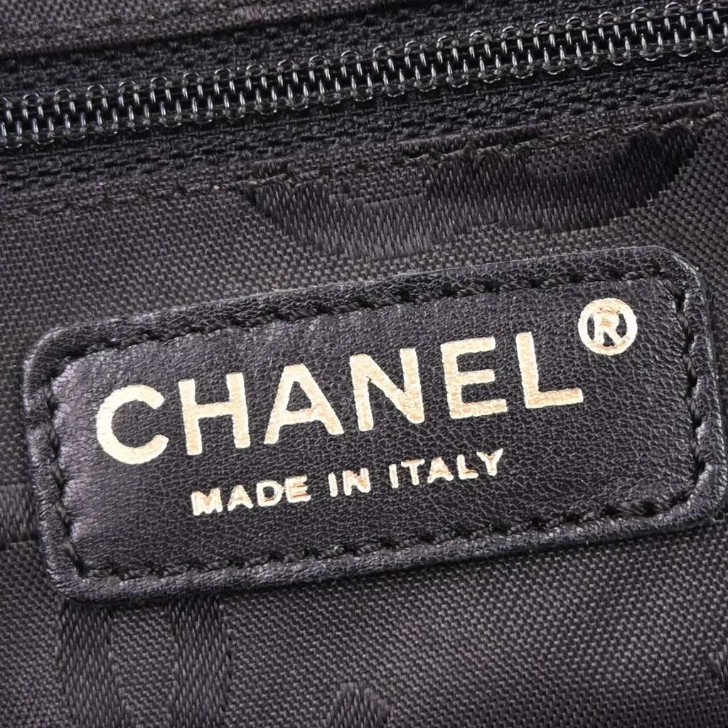 Chanel Surpique Tote Black Leather Good - Model View