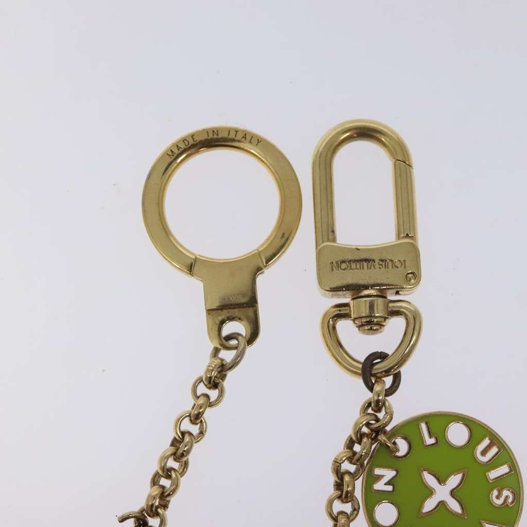 Louis Vuitton Porto Cles Looping Bag Charm and Key Holder Gold Metal Good condition - Box View