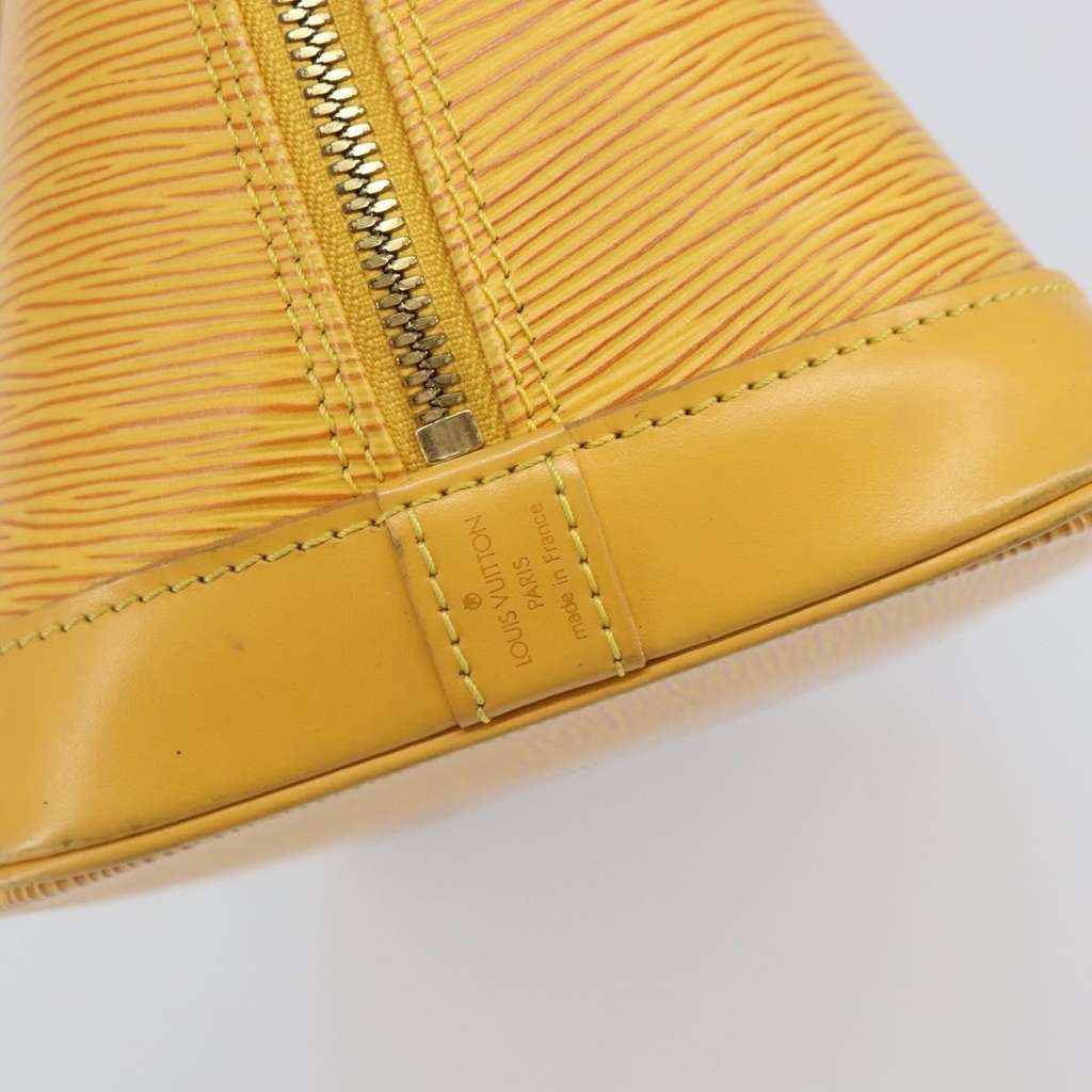 Louis Vuitton Alma Handbag Yellow Leather Fair condition - Box View