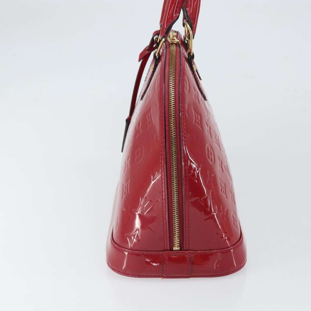 Louis Vuitton Alma Handbag Red Good condition - Model View