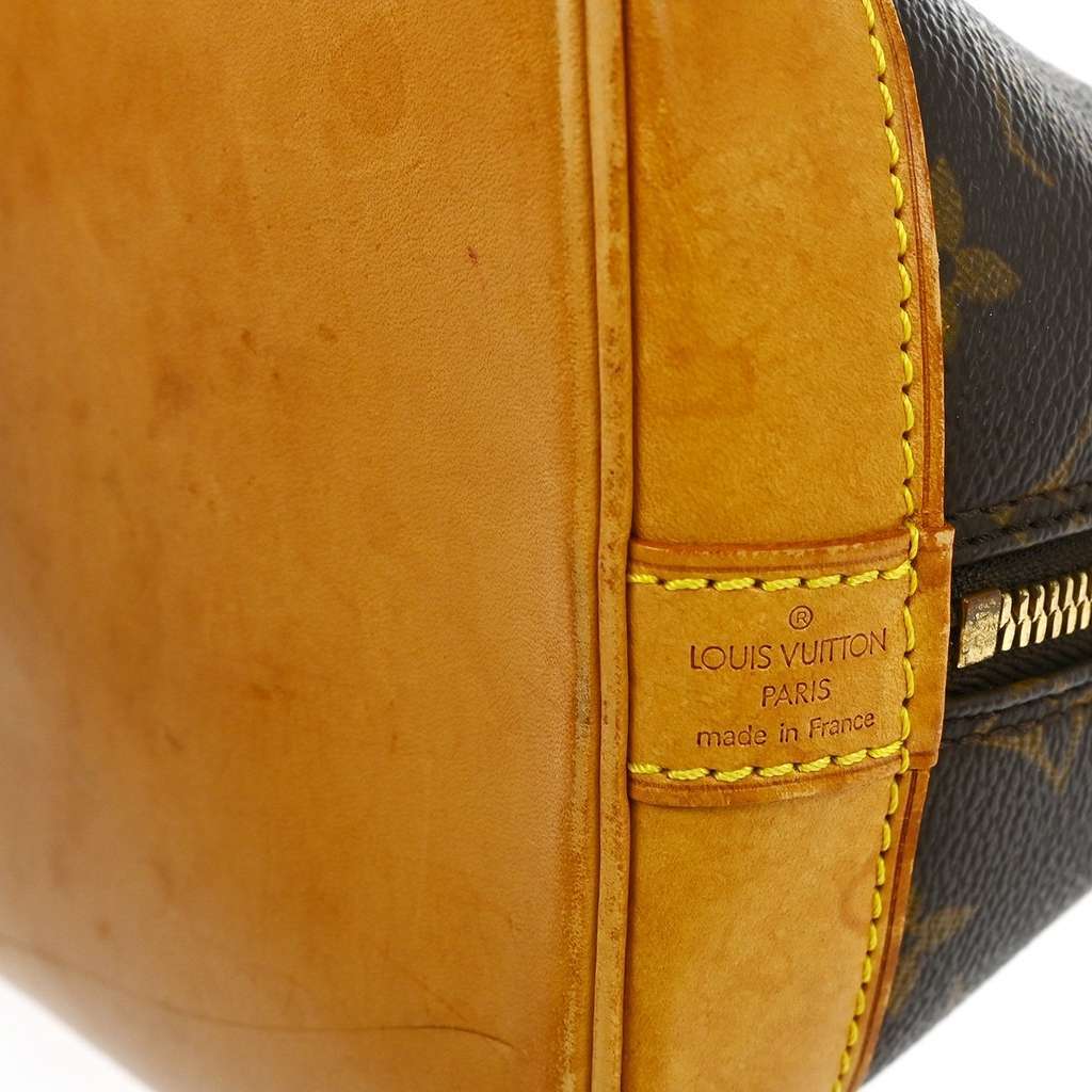 Louis Vuitton Alma Handbag Brown Canvas Fair condition - Model View