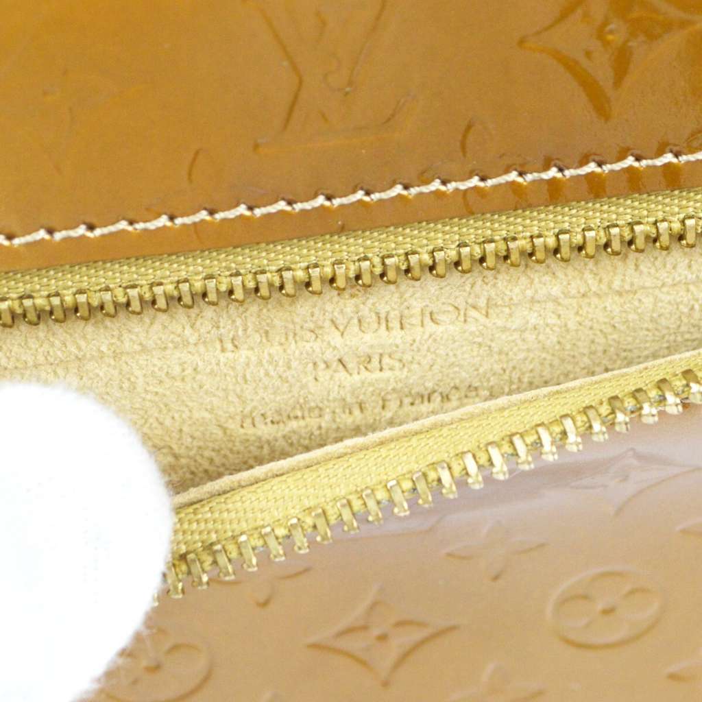 Louis Vuitton Conte De Fees Pochette Hibou Gold Good condition - Model View