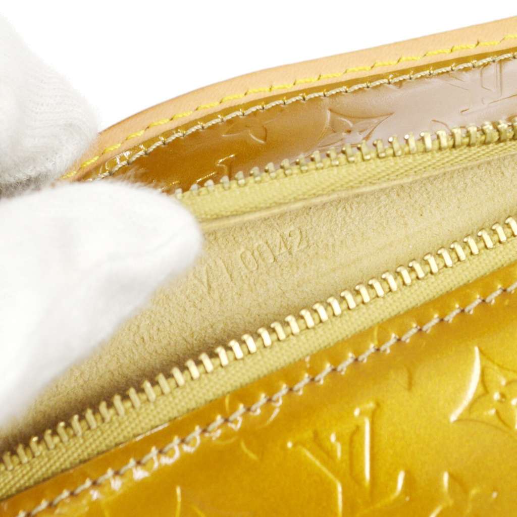 Louis Vuitton Conte De Fees Pochette Hibou Gold Good condition - Box View