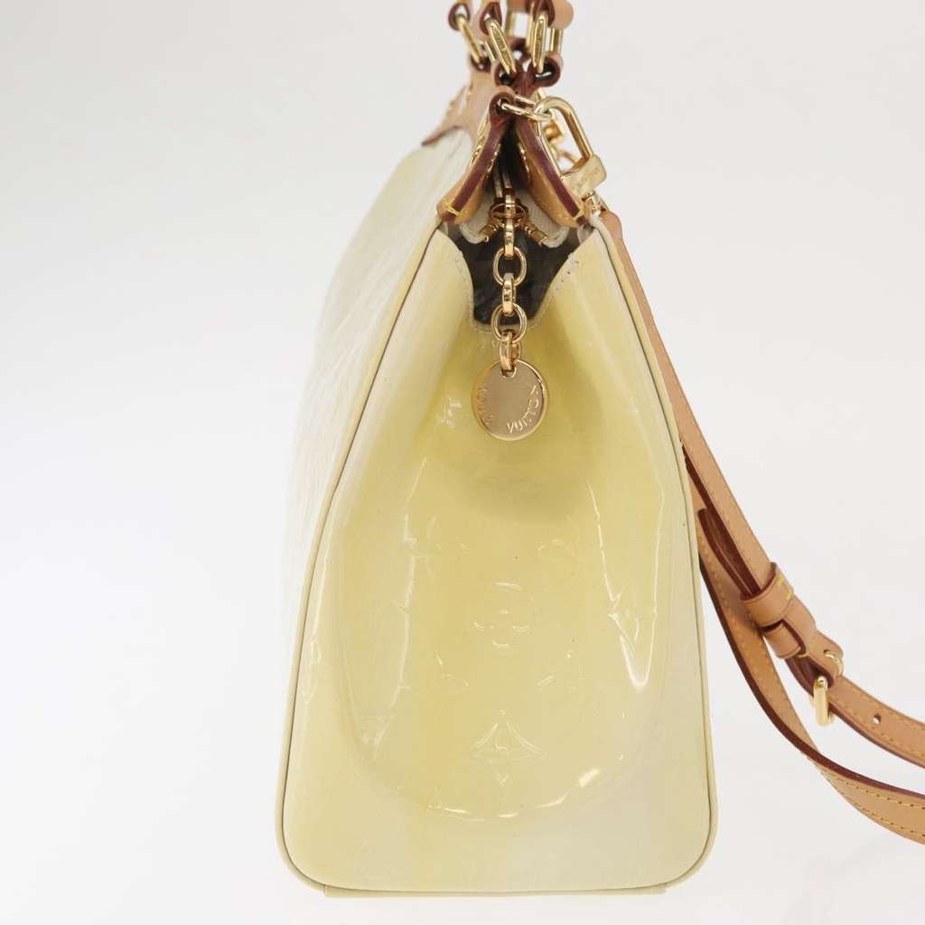 Louis Vuitton Brea Handbag Beige Good condition - Model View