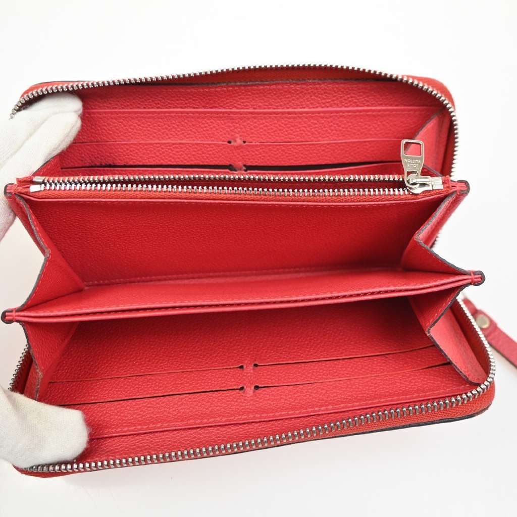 Louis Vuitton Portefeuille zippy Monogramme Empreinte Red Leather Fair condition - Box View