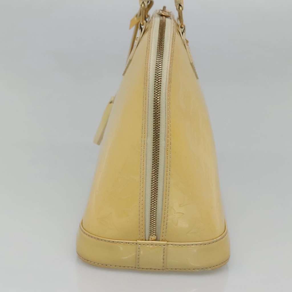 Louis Vuitton Alma Handbag Beige Fair condition - Model View