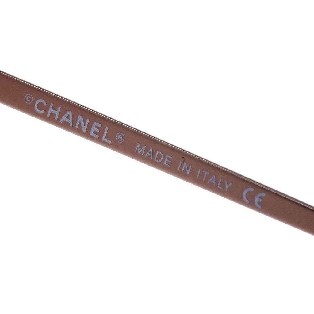 Chanel Logo CC Sunglasses Orange Metal Good condition - Model View