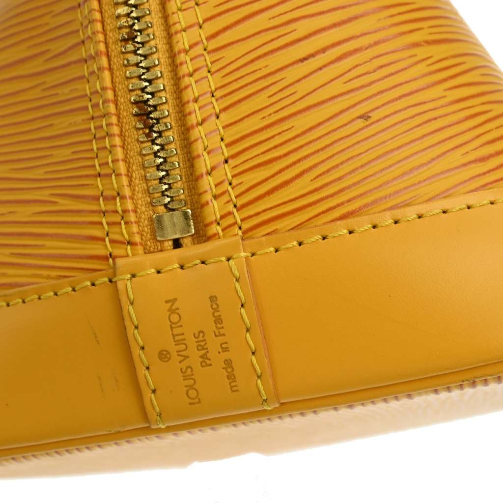 Louis Vuitton Alma Handbag Yellow Leather Good condition - Box View