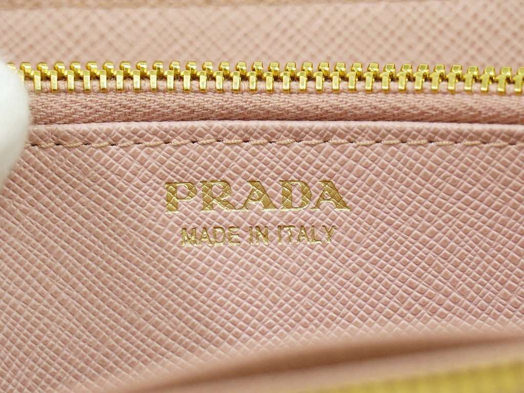 Prada Bow Zip Around Wallet Pink Leather Very good condition - Model View