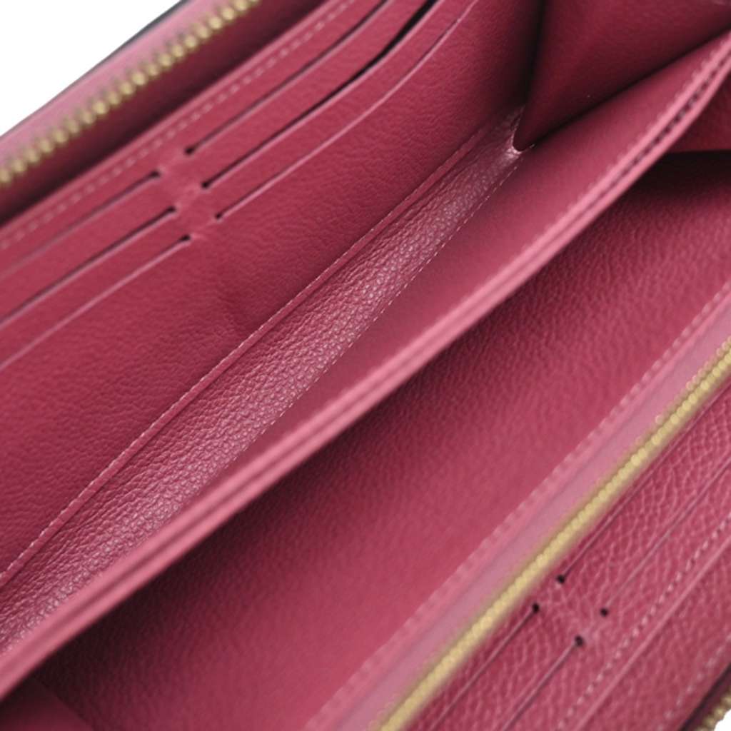 Louis Vuitton Portefeuille zippy Monogramme Empreinte Purple Leather Good condition - Box View