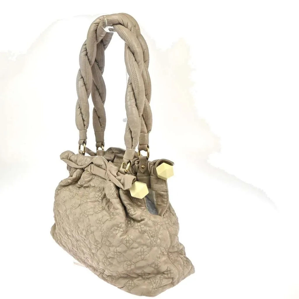 Louis Vuitton Olympe Stratus Handbag Beige Leather Good - Model View