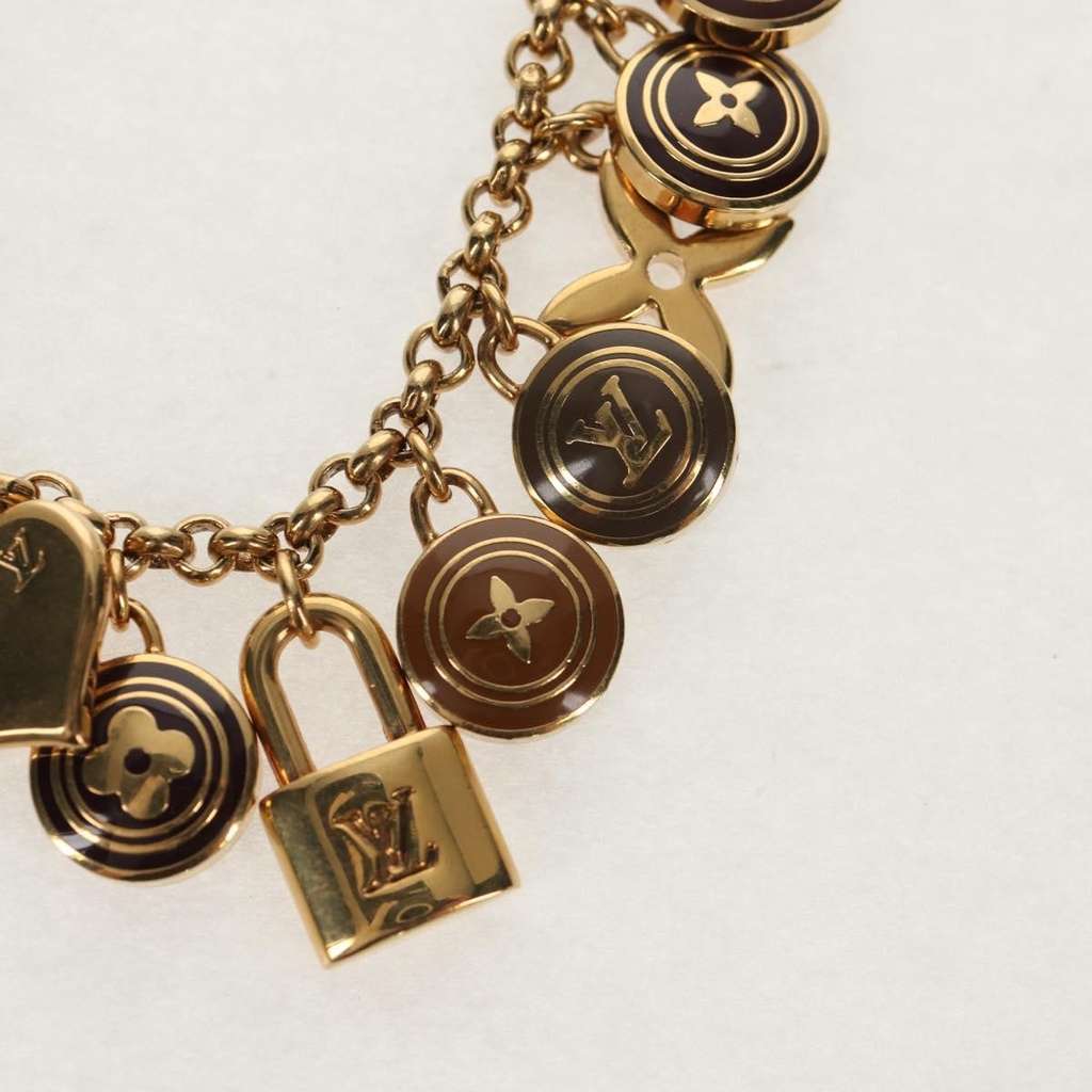 Louis Vuitton Pastilles Bag Charm and Key Holder Gold Metal Good condition - Model View