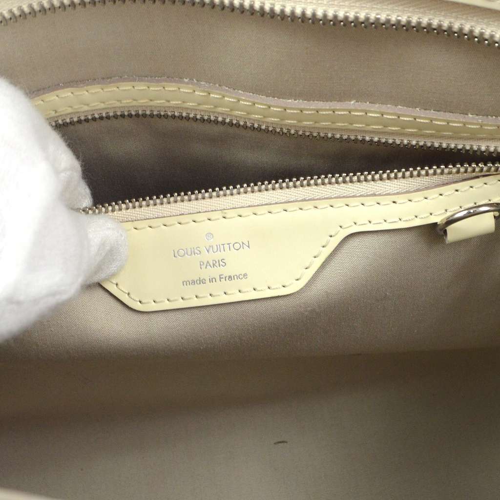 Louis Vuitton Brea Handbag Beige Leather Good condition - Model View
