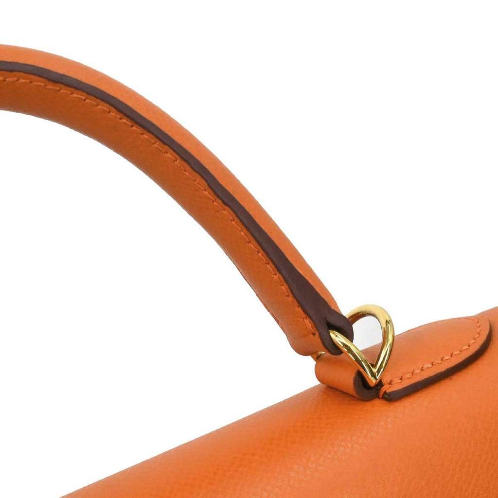 Hermès Kelly Handbag Orange Leather Never worn - Box View