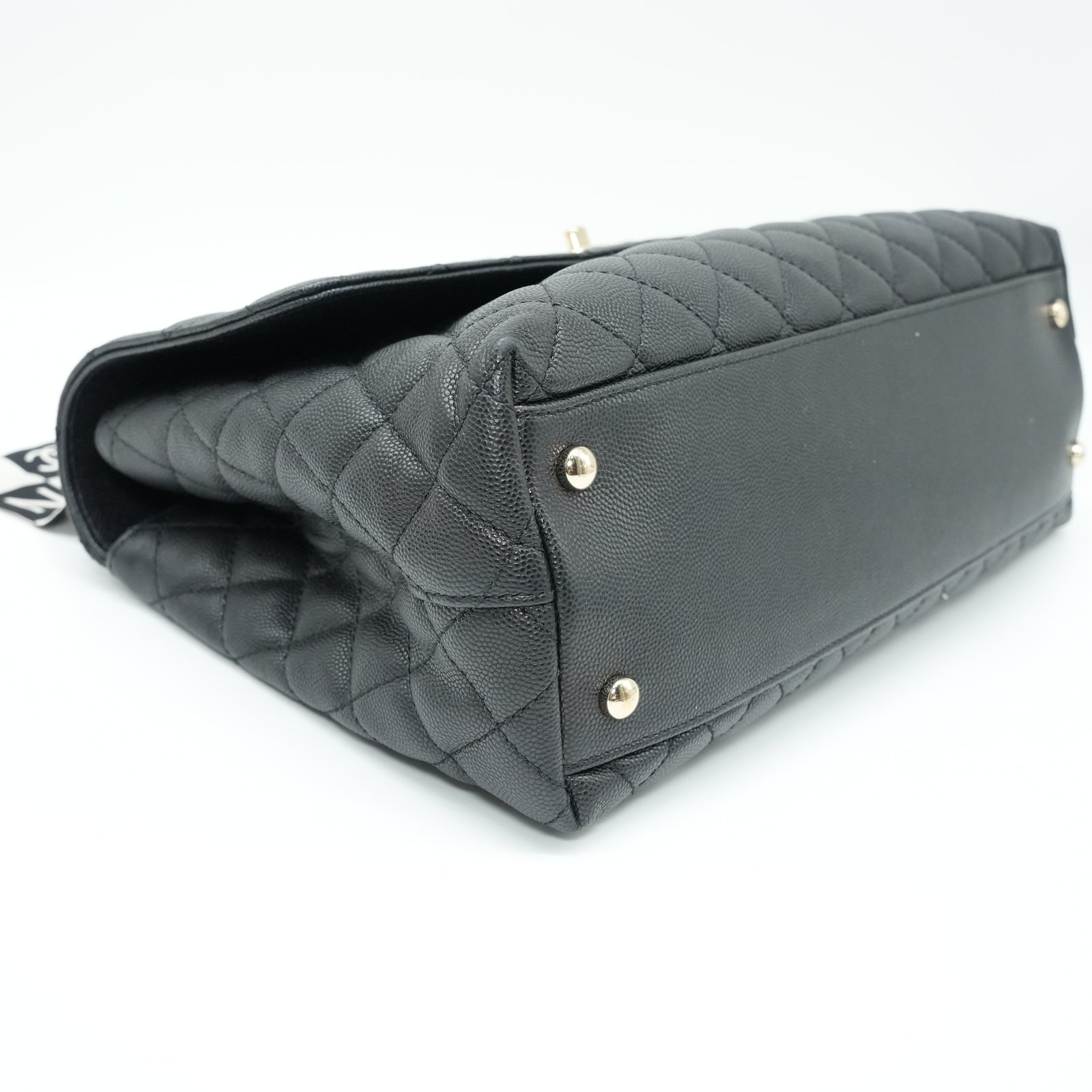 Chanel Flap Bag Top Handle Grained Caviar Noir - Side view